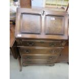 Oak bureau with 4 drawers under