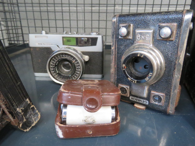 Cage containing a quantity of cameras - Image 4 of 4