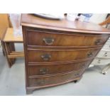 Reproduction mahogany bow fronted chest of 4 drawers