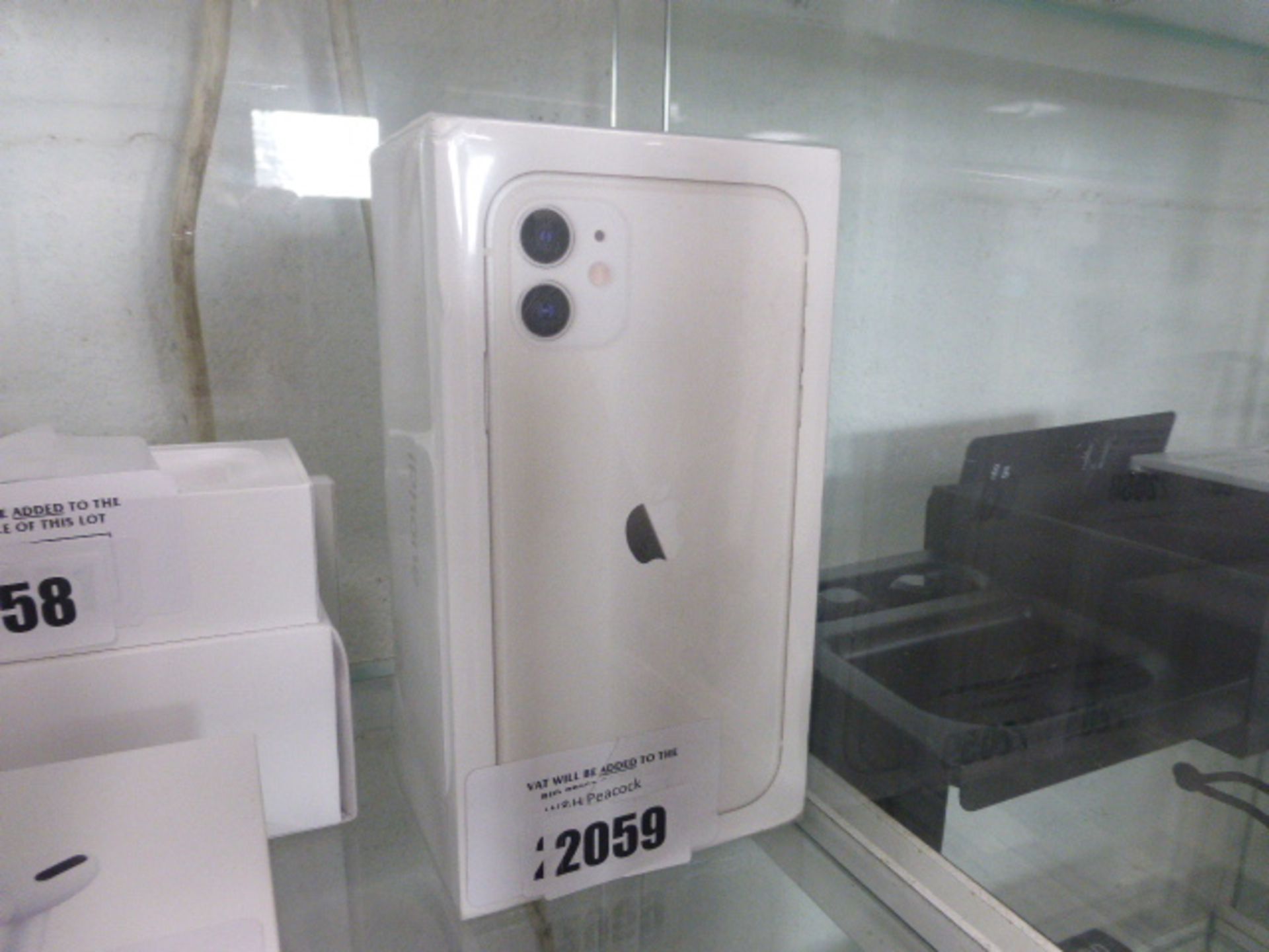 2048 Apple IPhone 11 in white with 128GB storage. Model A2221, in sealed box