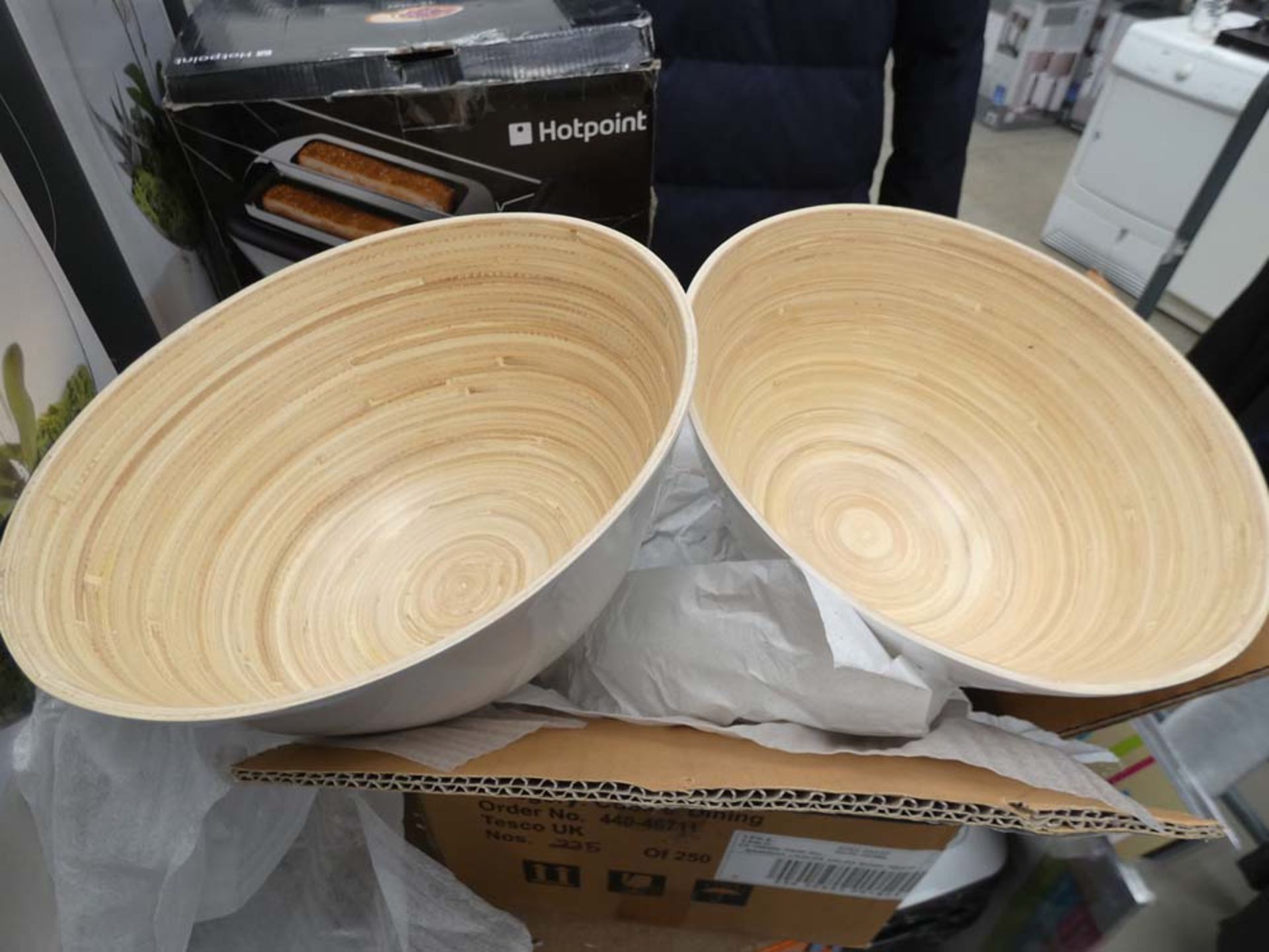 Box containing salad bowls