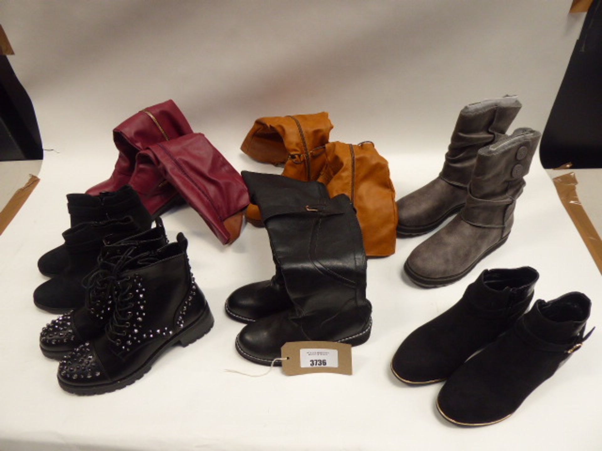 Bag of assorted boots and ankle boots