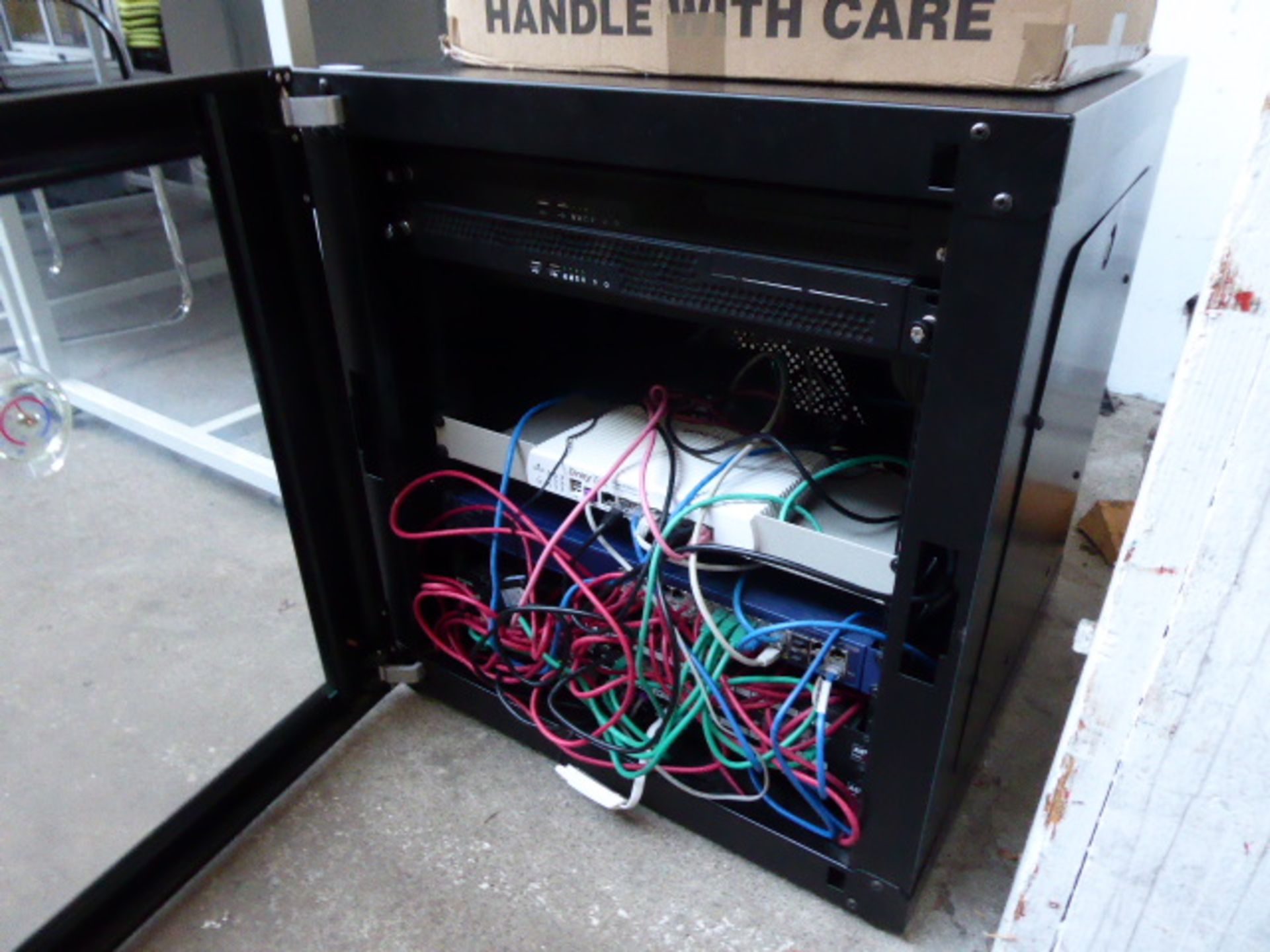 A small comms cabinet with Trade Tech Security Firewall, Netgear patch panel, plus Assynia patch - Image 2 of 3