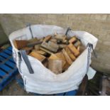 Builders bag containing chopped wood