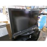 (18) Sony Bravia large screen TV with stand and remote