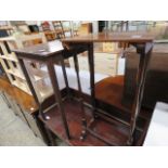 Edwardian mahogany occasional table and similar slender table