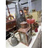 Table top of collectibles incl. oil lamp, graduated cane baskets, paraffin lamp and bell