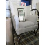 White upholstered wing back armchair *Collector's Item: Sold in accordance with our Soft
