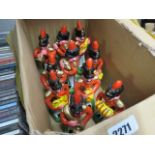 Box containing 10 soldier musician figurines