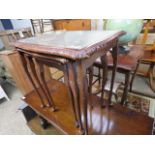 Nest of 3 glass top mahogany coffee tables