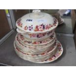 Stack of Alfred Meakin dinner plates and serving dish