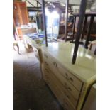 Kidney shaped dressing table with 3 panel mirror above with matching 5 drawer bedroom chest