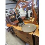 Satin walnut serpentine fronted dressing chest with large bevelled mirror over