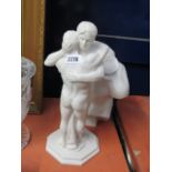 Marble torso statue with pair of embracing figures