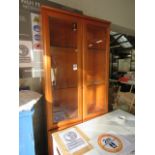Double door glazed front display cabinet