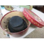 Hat box containing ladies hat in black