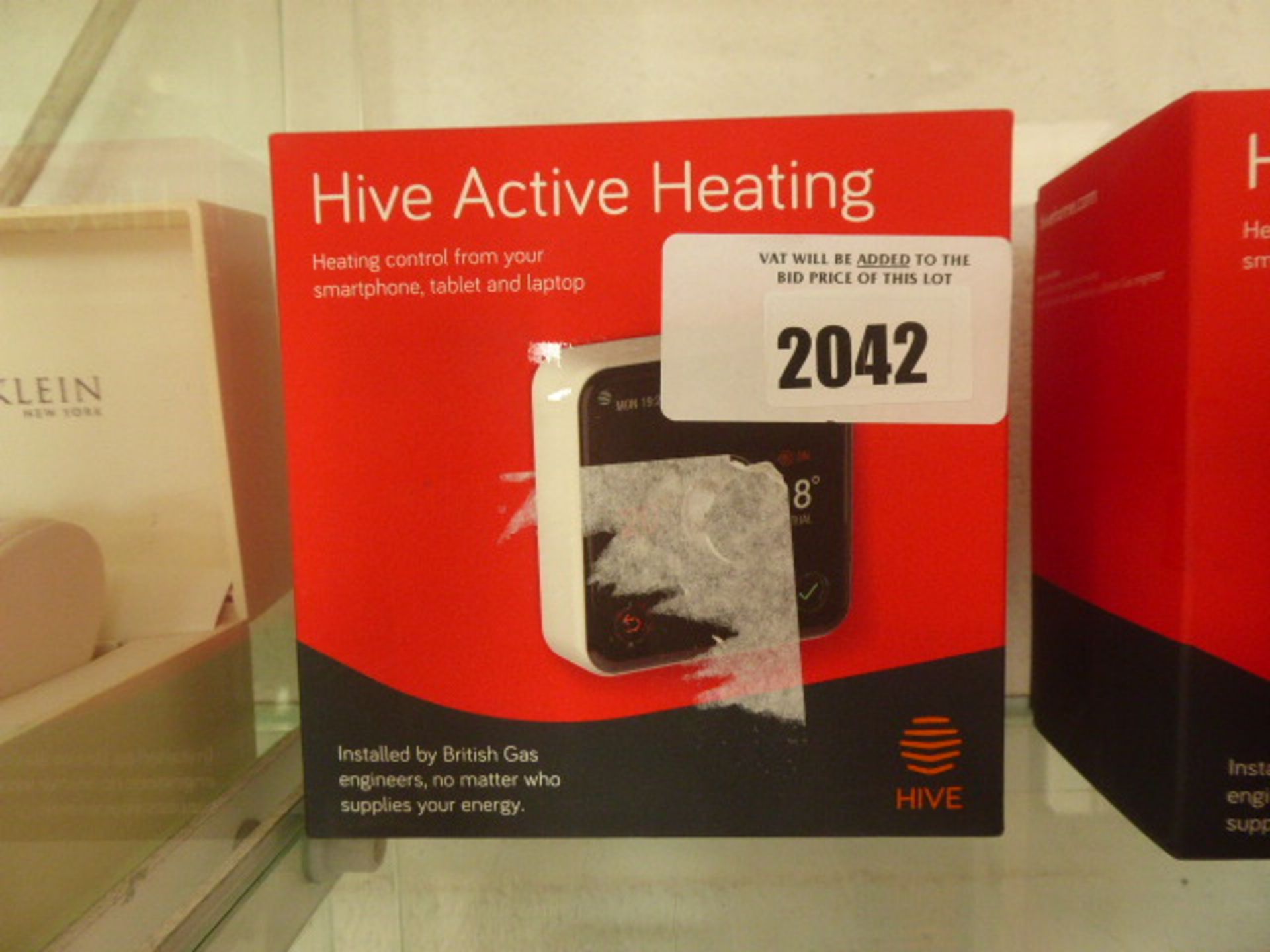 2 Hive Active Heating thermostat controls with boxes