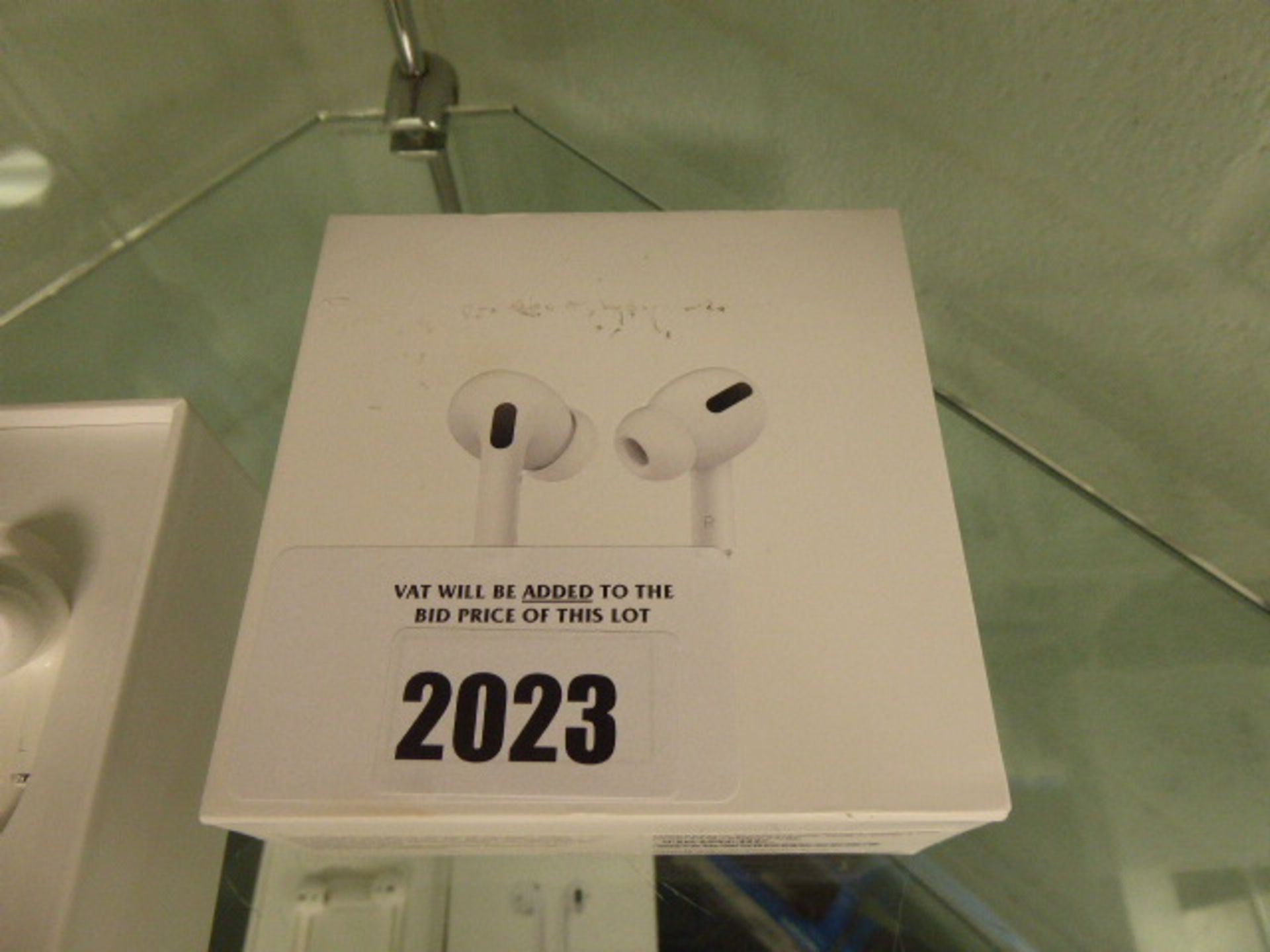 Apple AirPods Pro with wireless charging case, spare eartips and box