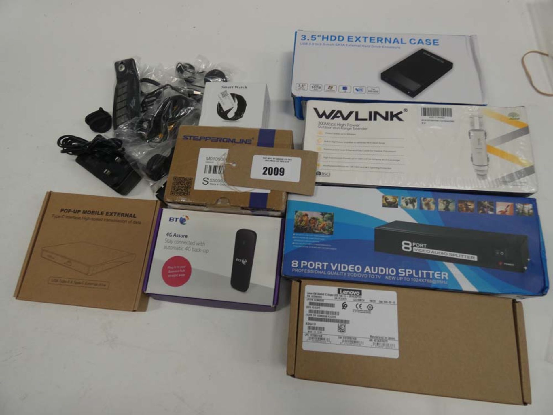 Bag containng Wavlink, 8 port video audio splitter, external CD drive, smart watch, BT 4G Assure