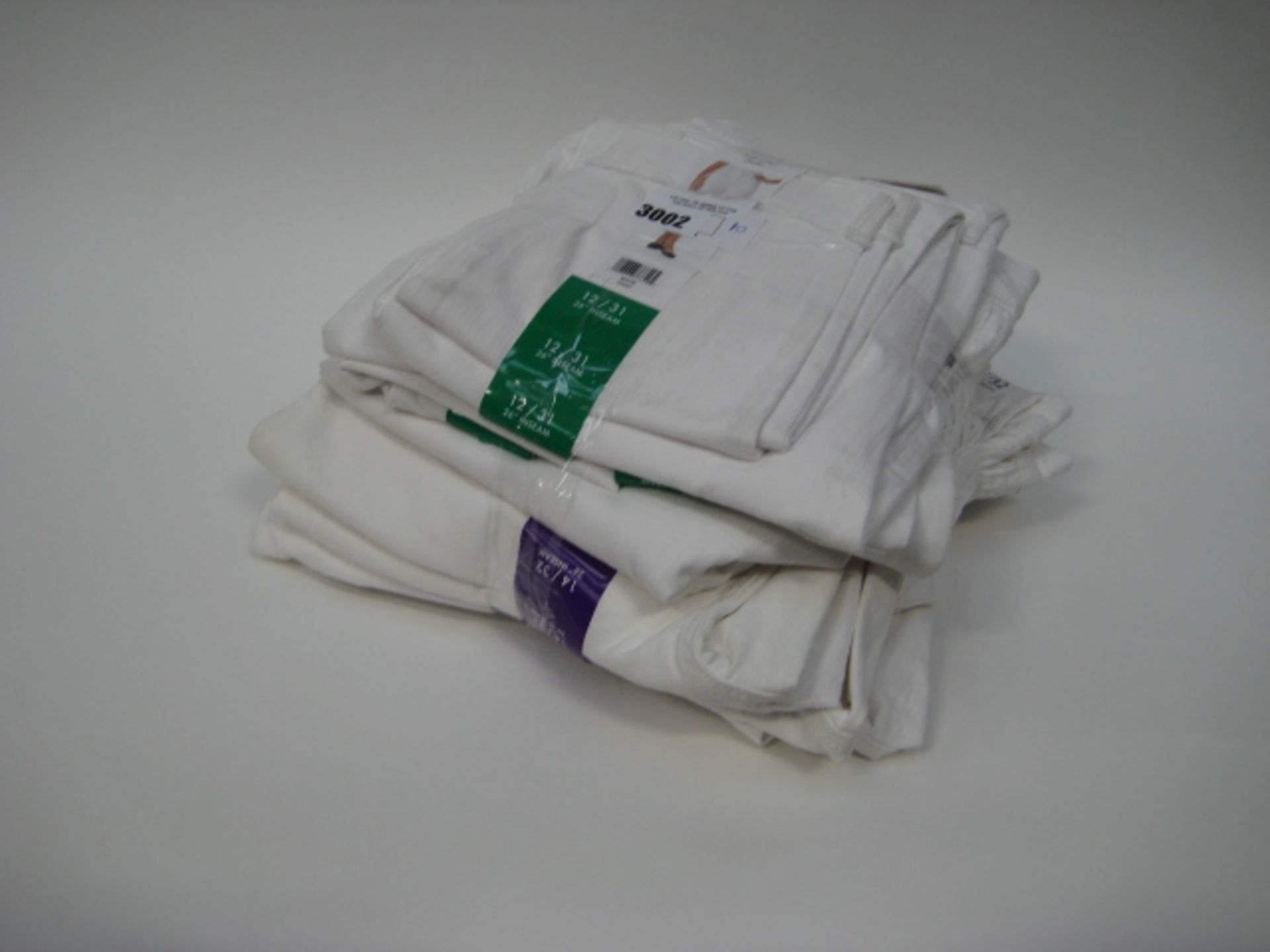 Pack of 10 ladies roll crop skinny jeans in white - various sizes