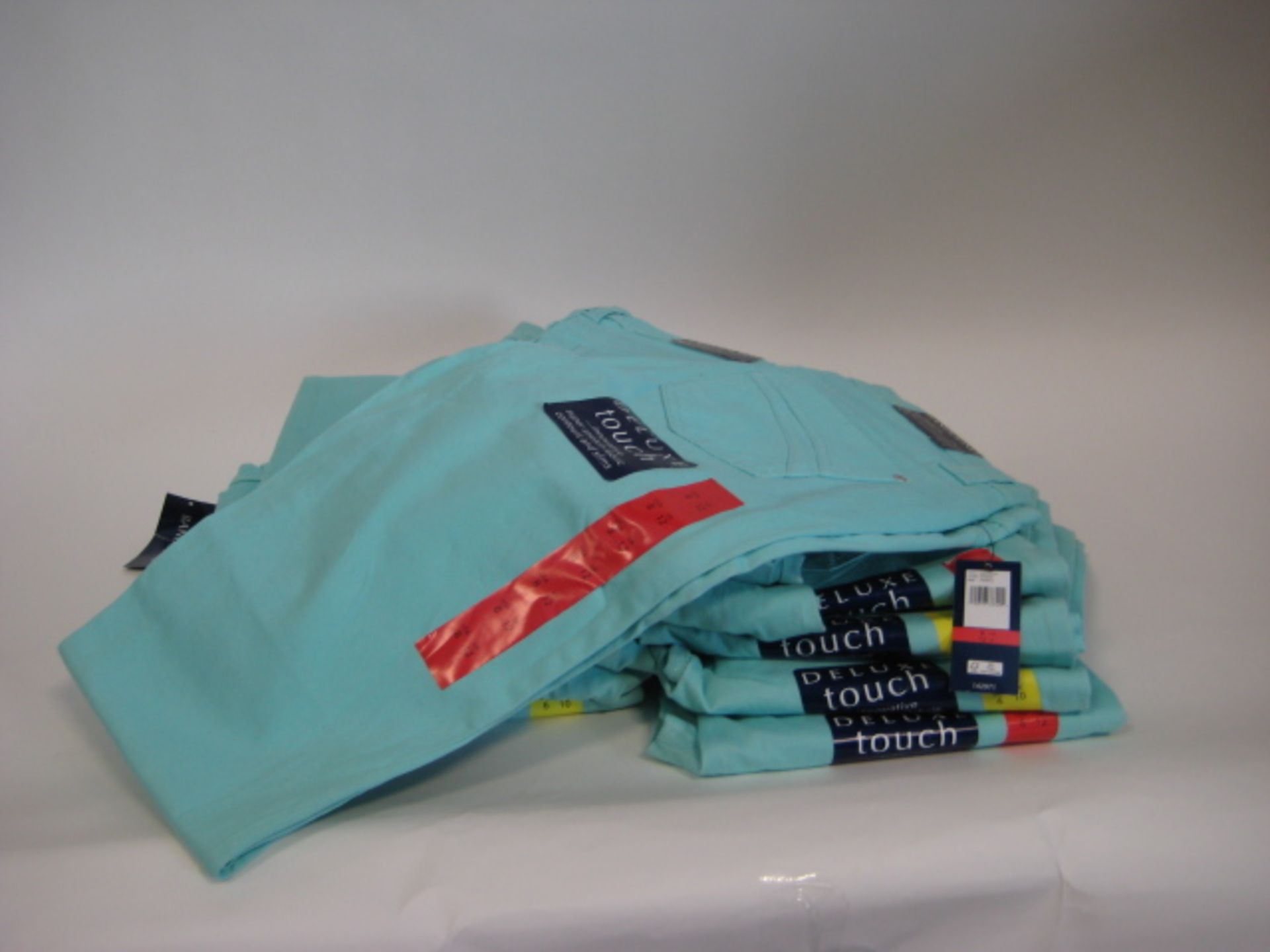 Bag containing 13 pairs of ladies Bandolino jeans sizes 10-12 in light purple