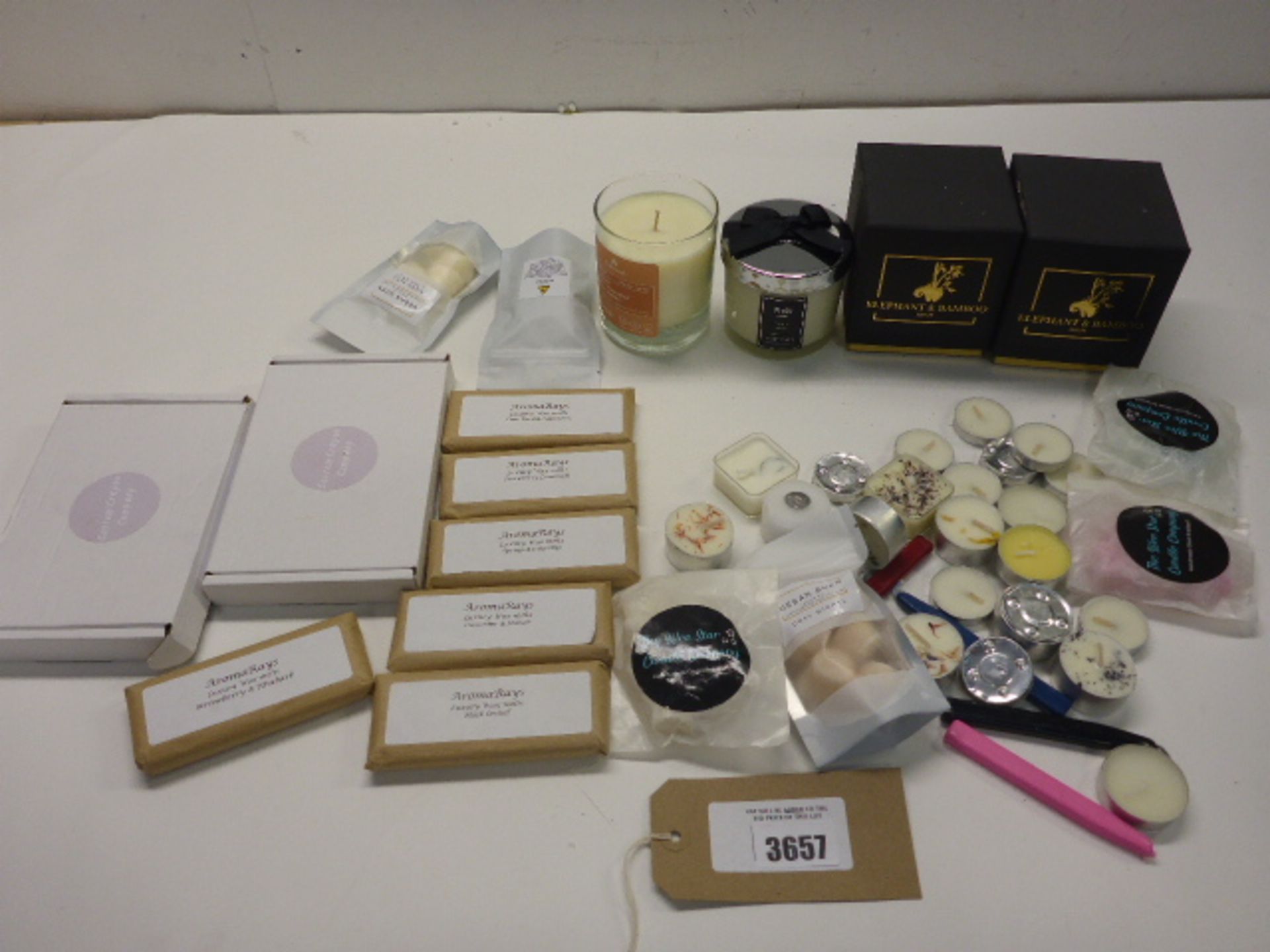 Selection of scented candles, tea lights and wax melts
