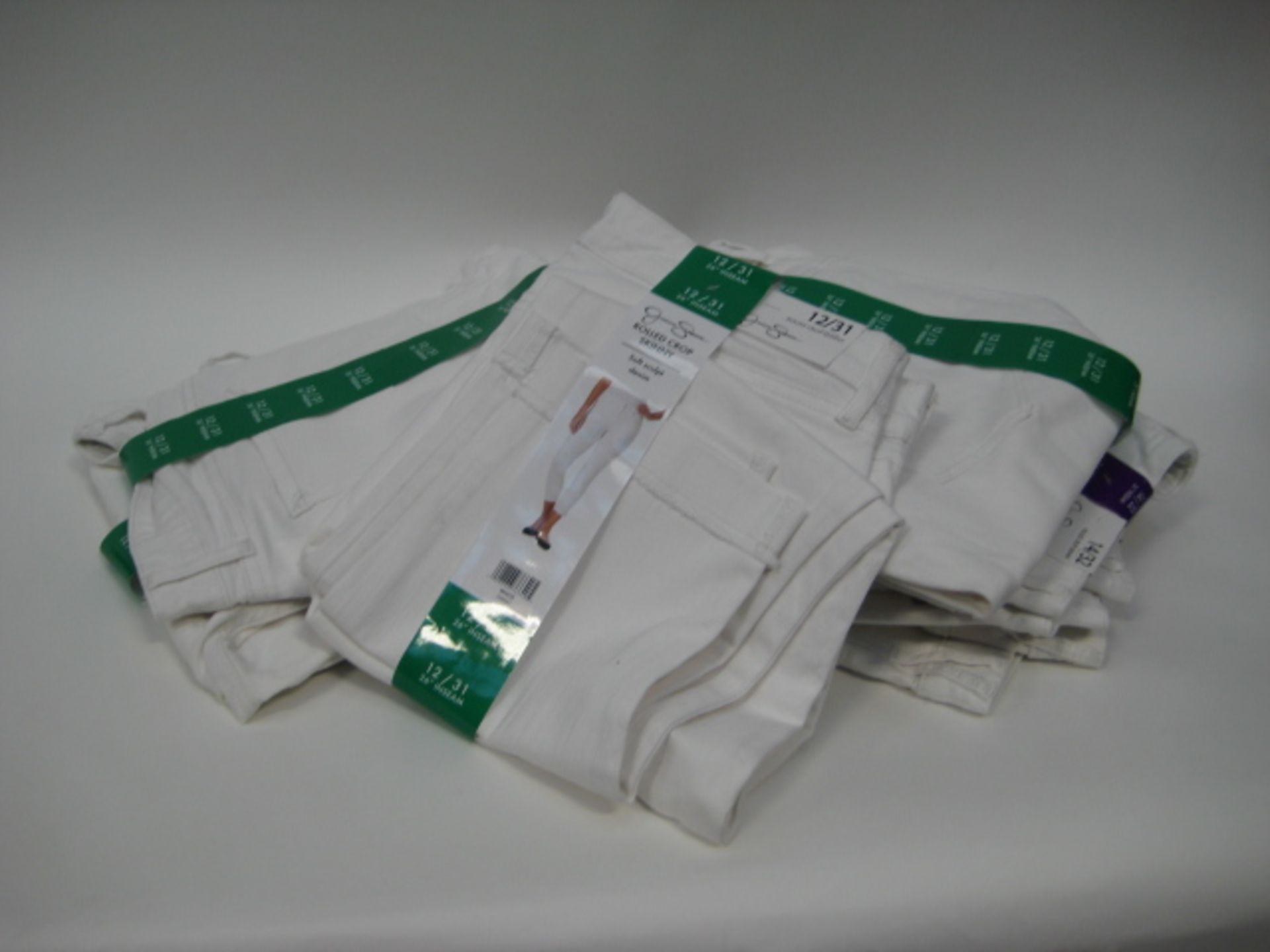 Bag of Jessica Simpson roll crop skinny jeans in white - various sizes