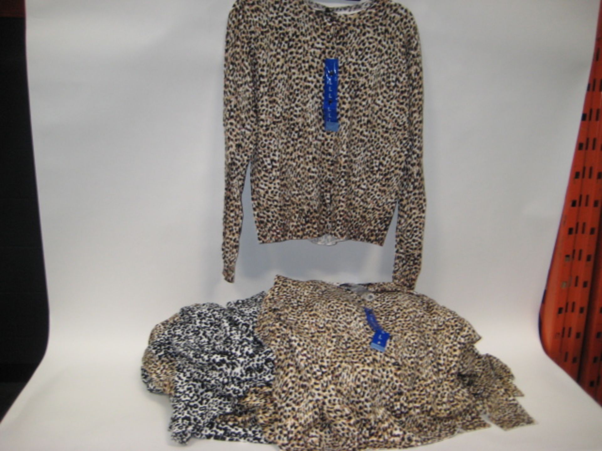 Bag of 26 June Perry knitted jersey buttoned ladies tops in animal print finish mainly sizes L & XL