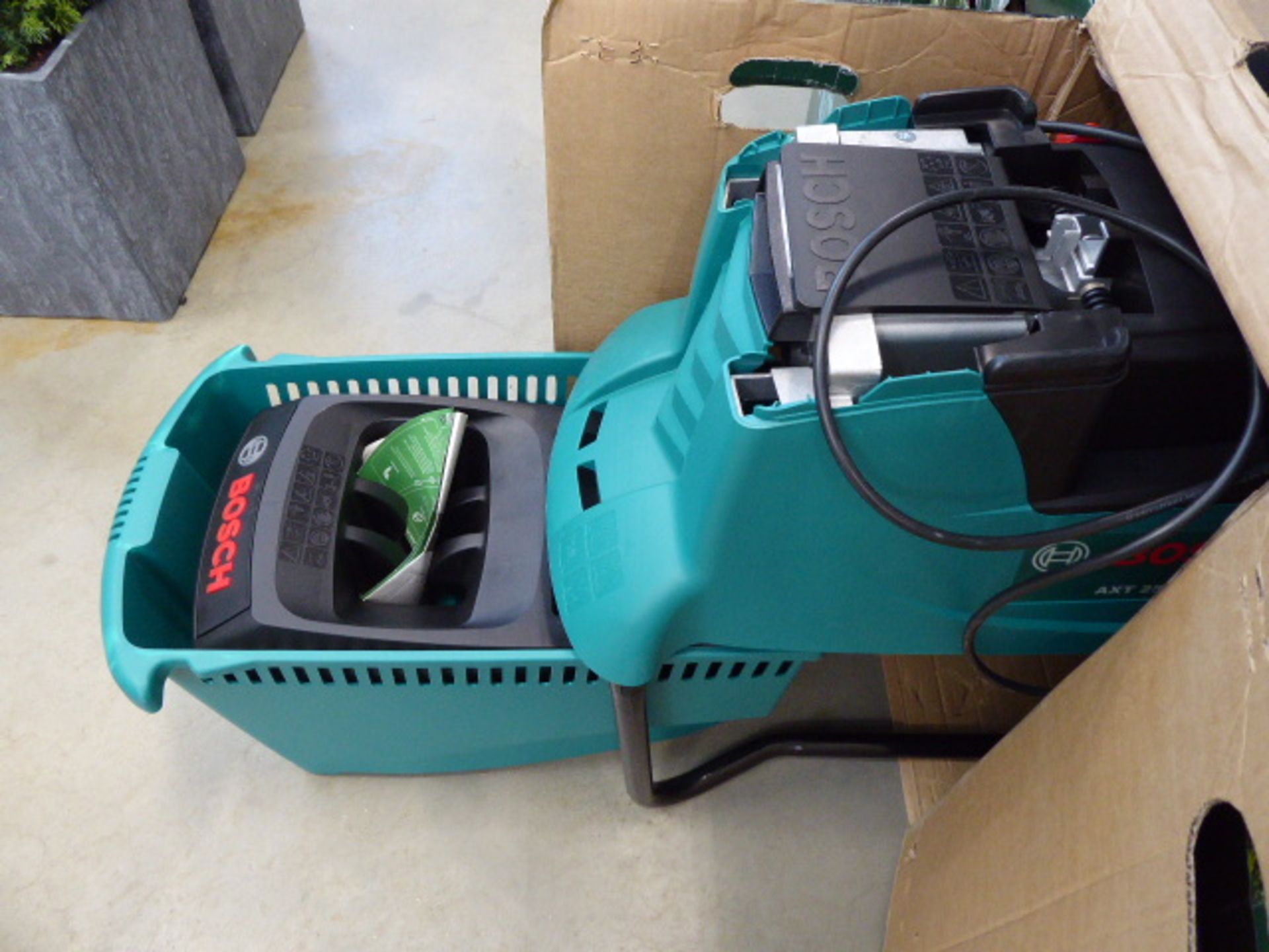 Boxed Bosch AXT25TC electric garden shredder