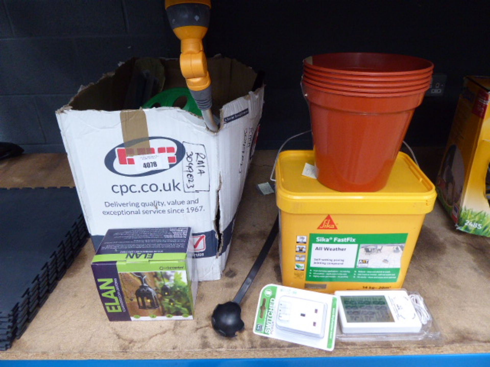 Sika Fast Fix jointing compound and box of garden items incl. lamps, flowerpots, sprinklers etc.