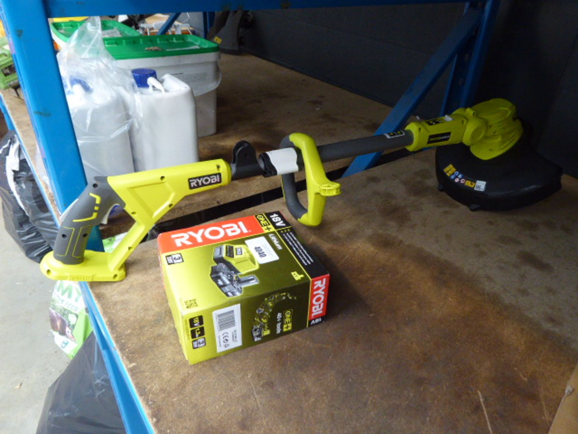 Ryobi battery powered strimmer with battery and charger