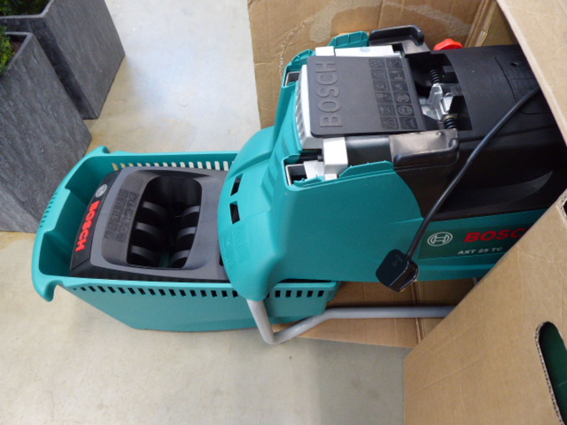 Boxed Bosch AXT25TC electric garden shredder