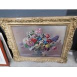 5128 - A framed oleograph, still life with flowers