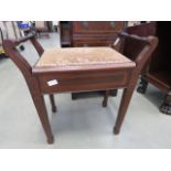 5172 - An Edwardian piano stool with hinged seat