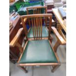 5570 - A pair of beech armchairs with drop in seats