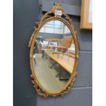 5464 Oval mirror in gold painted metal frame