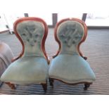 RR14 Two Victorian mahogany and button upholstered nursing chairs on turned legs with castors