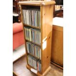 Modern pine open front CD storage unit with contents of mainly classical CDs