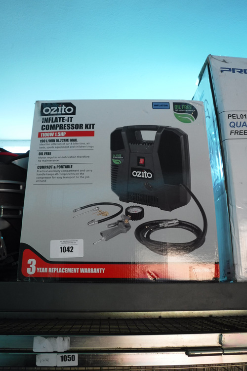 Boxed Ozito inflate it compressor kit