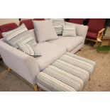 Grey 2 seater sofa with matching footstool