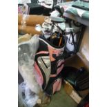 Master Golf pink and silver golf bag containing mixed branded golf clubs