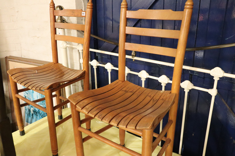 2 wooden dining chairs