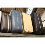 4 vintage hard shell suitcases