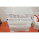 3 plastic storage boxes