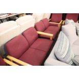 4 wooden maroon coloured office reception chairs with 2 matching 2 seater sofas