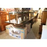 Modern trestle style extending dining table (some damage to surface) with 6 wooden framed brown