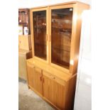 Mid century Danish teak glass display cabinet with cupboard and drawer storage below