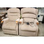 Near pair of brown upholstered wooden framed easy chairs, 1 electrically reclining