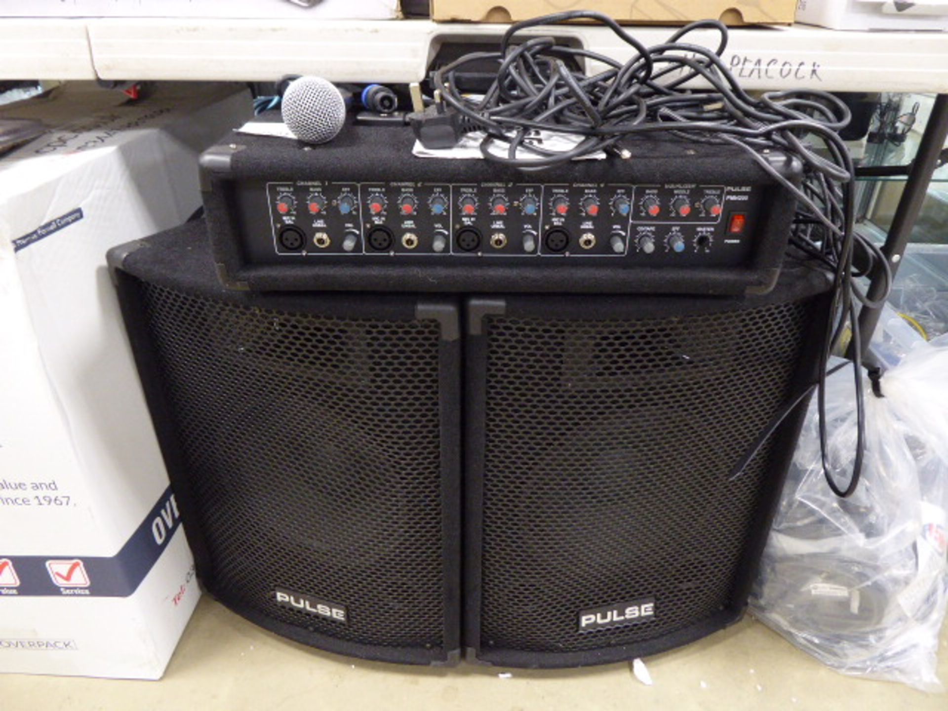 Pulse 4 channel 100W mixer amplifier together with a pair of passive pulse 2 way speakers