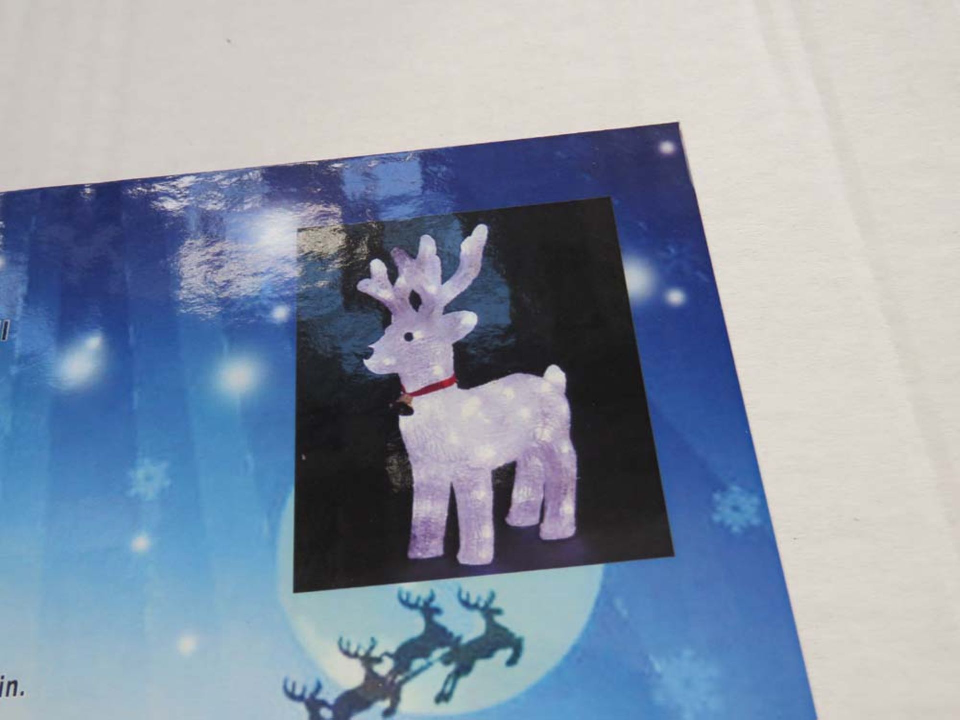 Lot containing a melted edge candle, a small Christmas projector and a 45cm acrylic rocking horse - Image 3 of 3